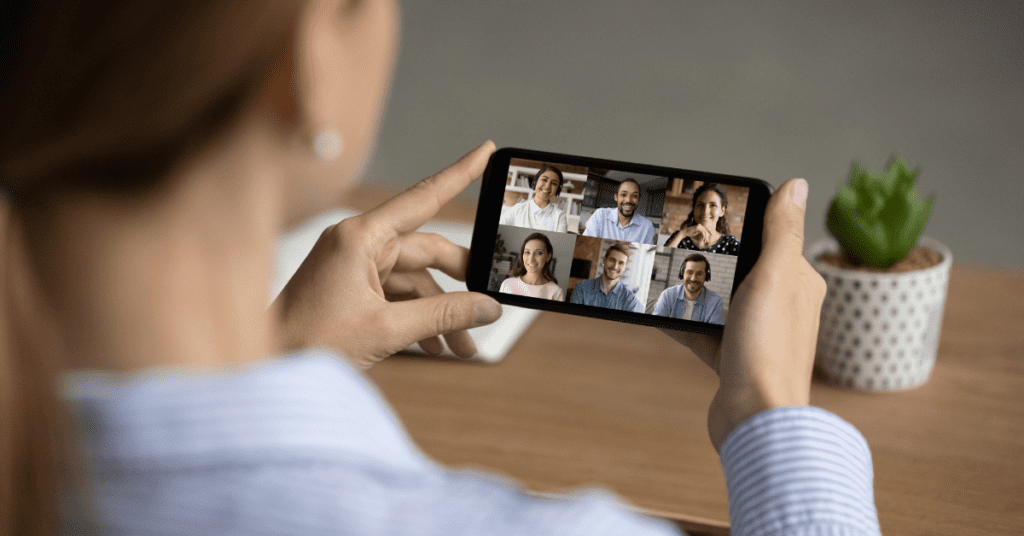 Woman staying connected to friends and family virtually on her phone